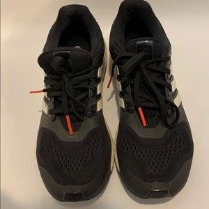 Men’s Adidas energy boost running shoes.